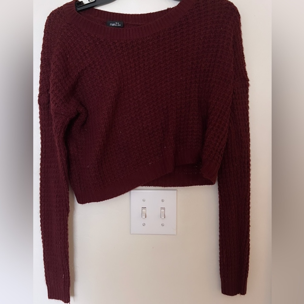 This a burgundy see- through sweater I got from RUE 21